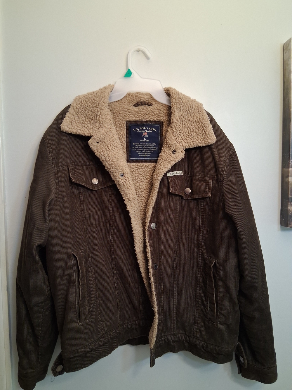 U.S. Polo Assn. Men’s Sherpa-Lined Corduroy Jacket in Brown.